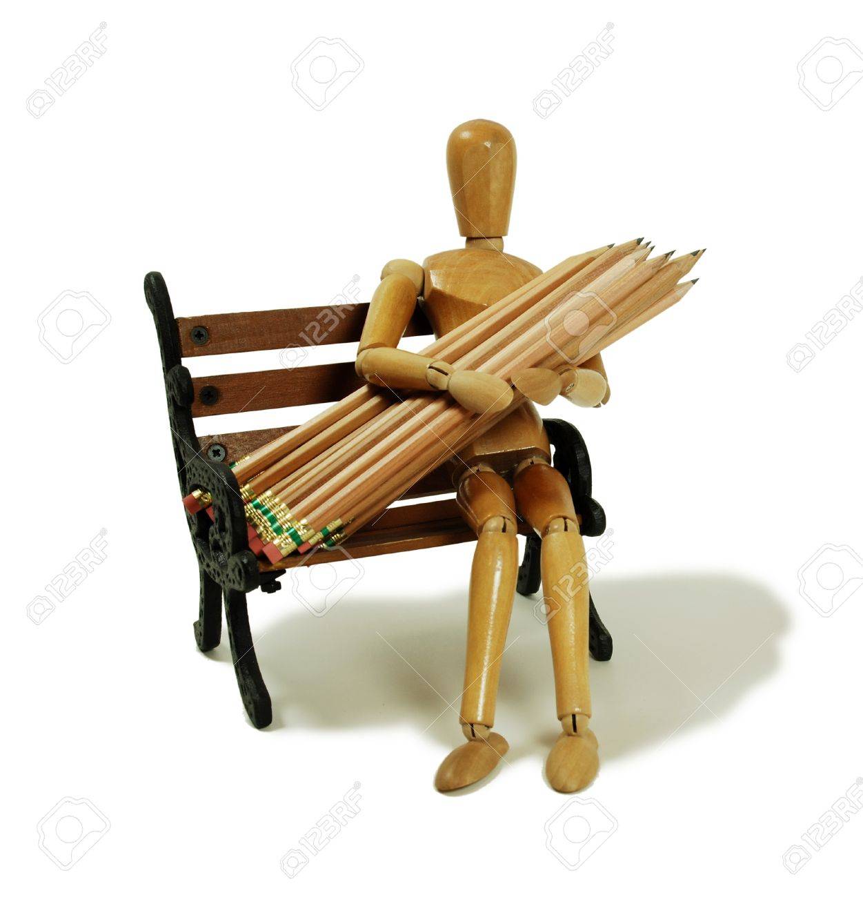 描画に使用される木製の鉛筆を持っている人を表す木のモデル の写真素材 画像素材 Image