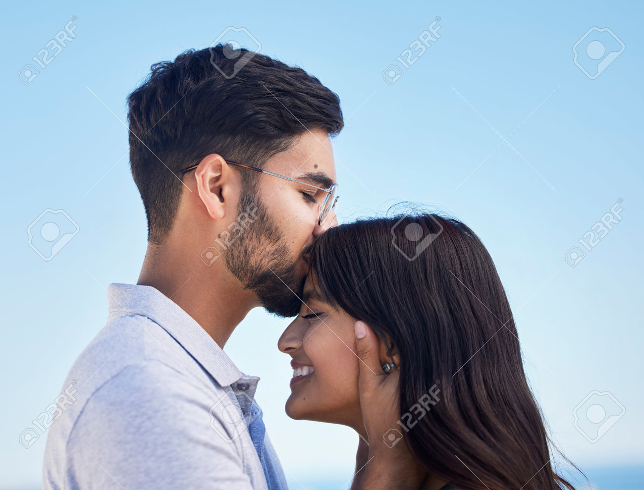 Couple, Forehead Kiss And Love Outdoor With Commitment, Trust And Happy  Together With Bonding And Care. Date, Romance And Relationship With Young  Man, Woman Profile And Smile Against Sky Background Stock Photo,, image size:1300x989