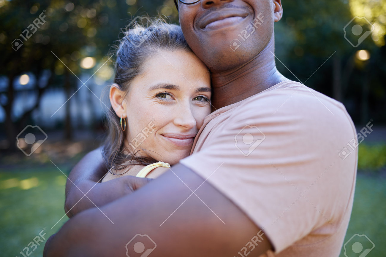 Interracial Relationship Hug, Park And Woman With Smile, Care And Love With  Black Man, Reunion And Happiness. Multicultural Embrace, Happy Couple And  Diversity On Nature Adventure, Bonding And Spring Stock Photo, Picture, image size:1300x867