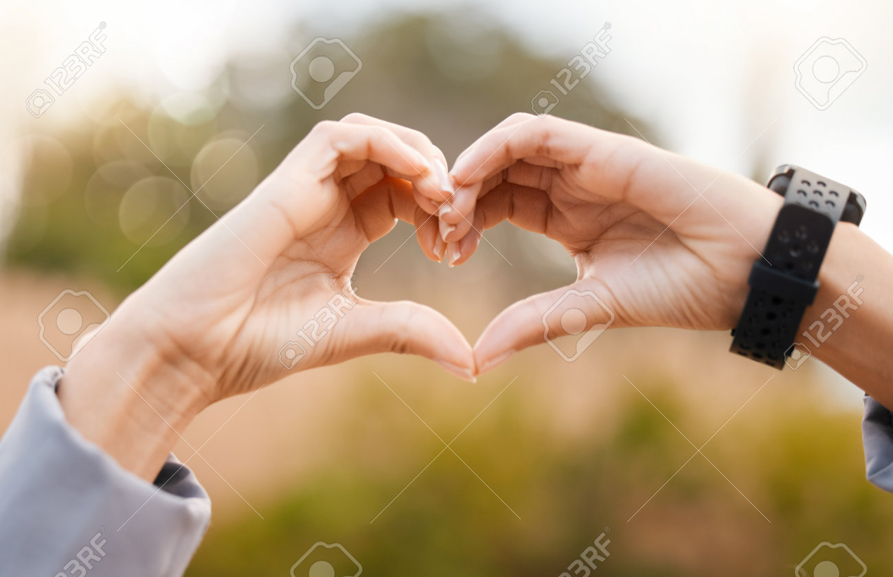 Heart Hands, Outdoor And Fitness Health For Cardiology Exercise, Running Or  Wellness Closeup. Like, Workout And Healthy Person With Love Sign And Smart  Watch In Park Or Nature For Care Emoji Фотография,