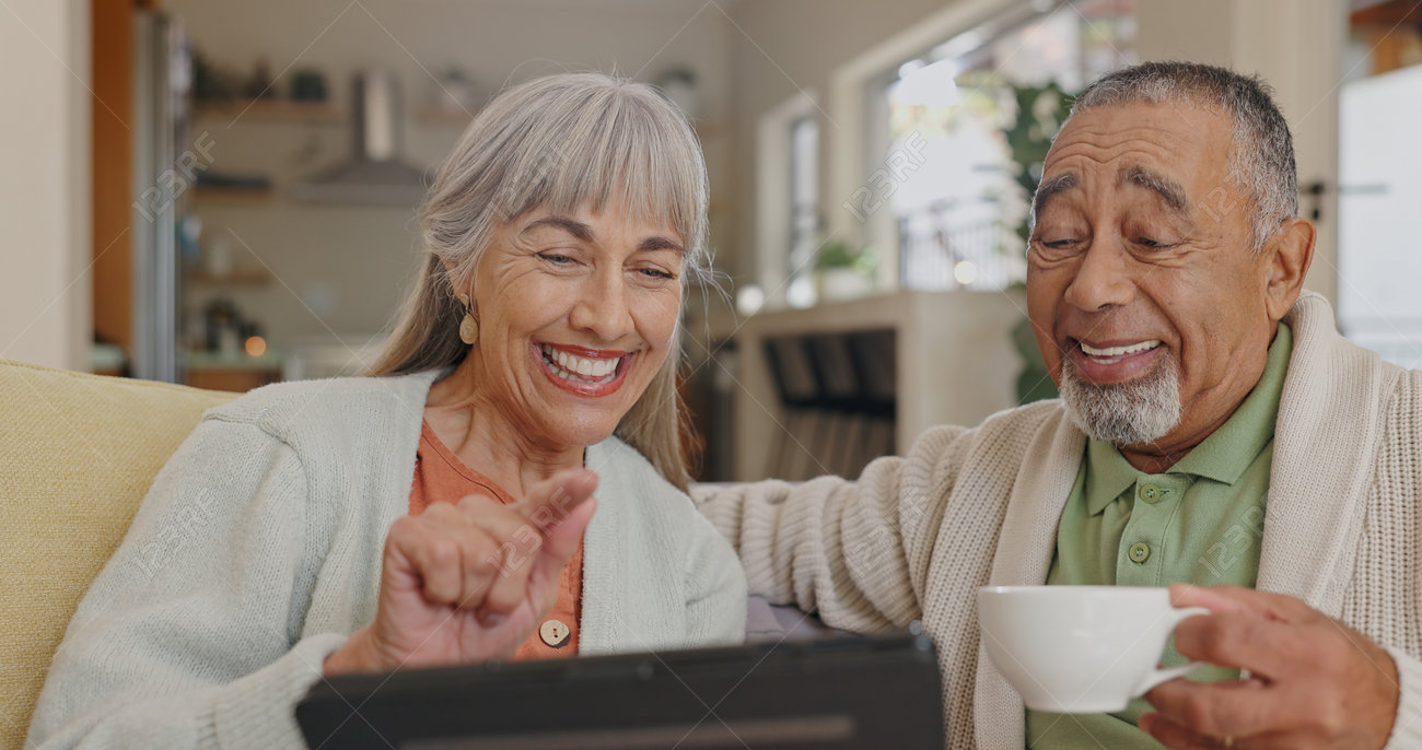 Interracial gifs Tablet, Laughing And Senior Couple On Couch With Retirement Meme And  Streaming Comedy Film In Home. Interracial Marriage, Elderly Man And Woman  With Tech On Sofa For Funny Gif And Reading Silly