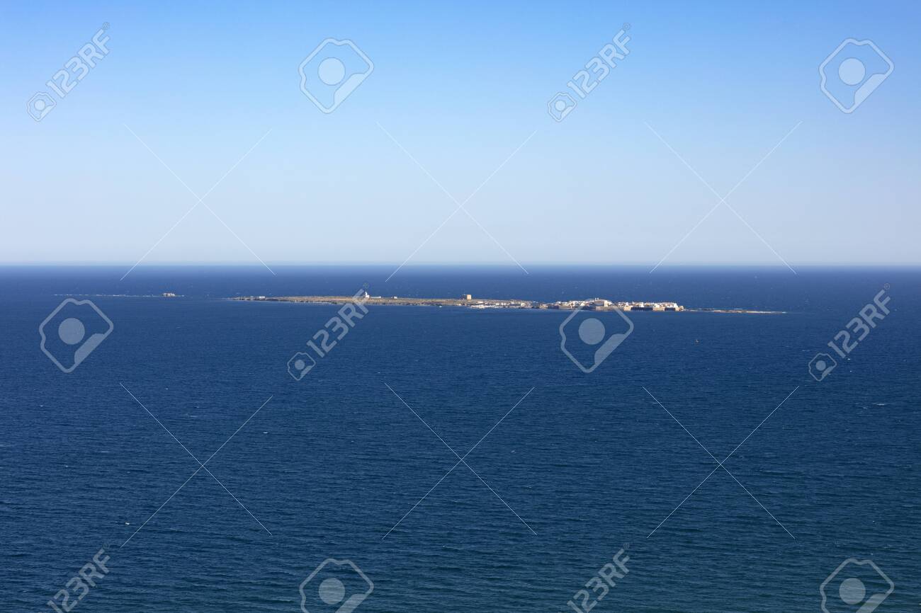 panoramic view of Tabarca island from the Santa Pola lighthouse in Alicante, Spain, on an intense blue mediterranean sea and clear sky - 123523655 panoramic view of Tabarca island from the Santa Pola lighthouse in Alicante, Spain, on an intense blue mediterranean sea and clear sky - 123523655
