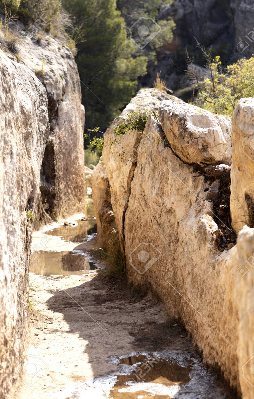 Roman aqueduct of the rock cut in Chelva, Valencia, built in the 1st century AC by the romans is one of the most important in Spain - 123523769 Roman aqueduct of the rock cut in Chelva, Valencia, built in the 1st century AC by the romans is one of the most important in Spain - 123523769