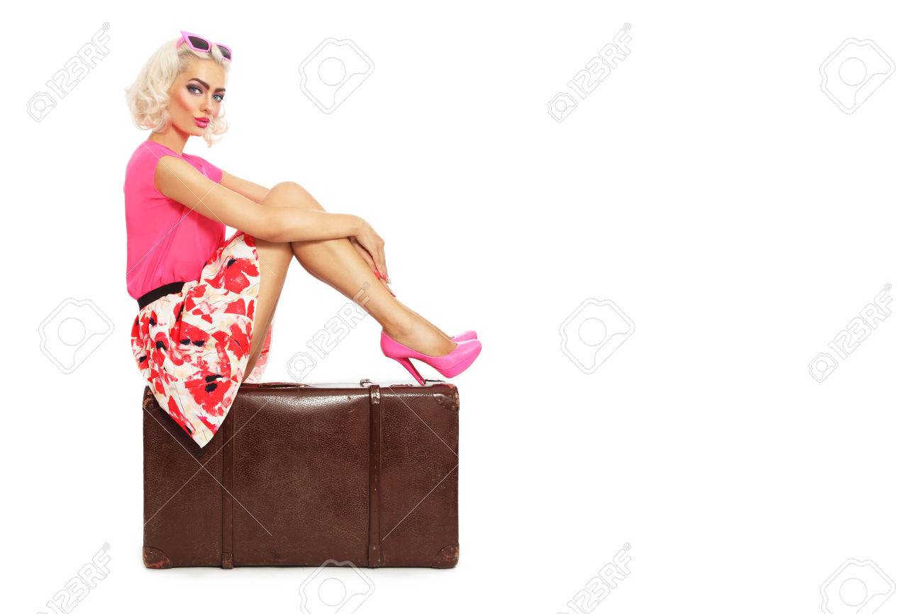Beautiful Sexy Blonde Pin Up Girl In Mini Skirt And Hot Pink Shoes Sitting On Beautiful Sexy Blonde Pin Up Girl In Mini Skirt And Hot Pink Shoes Sitting On