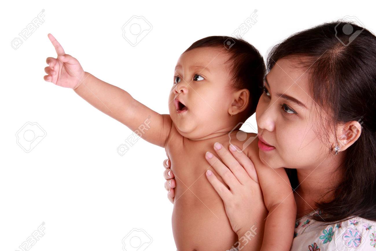 baby looking at mom