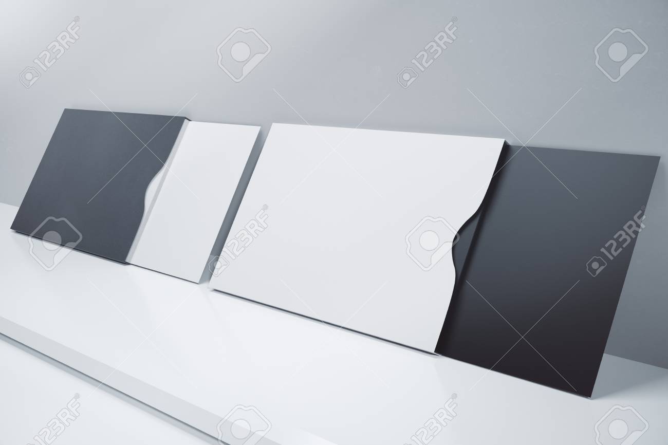side view of empty business cards leaning on concrete wall mock empty business cards