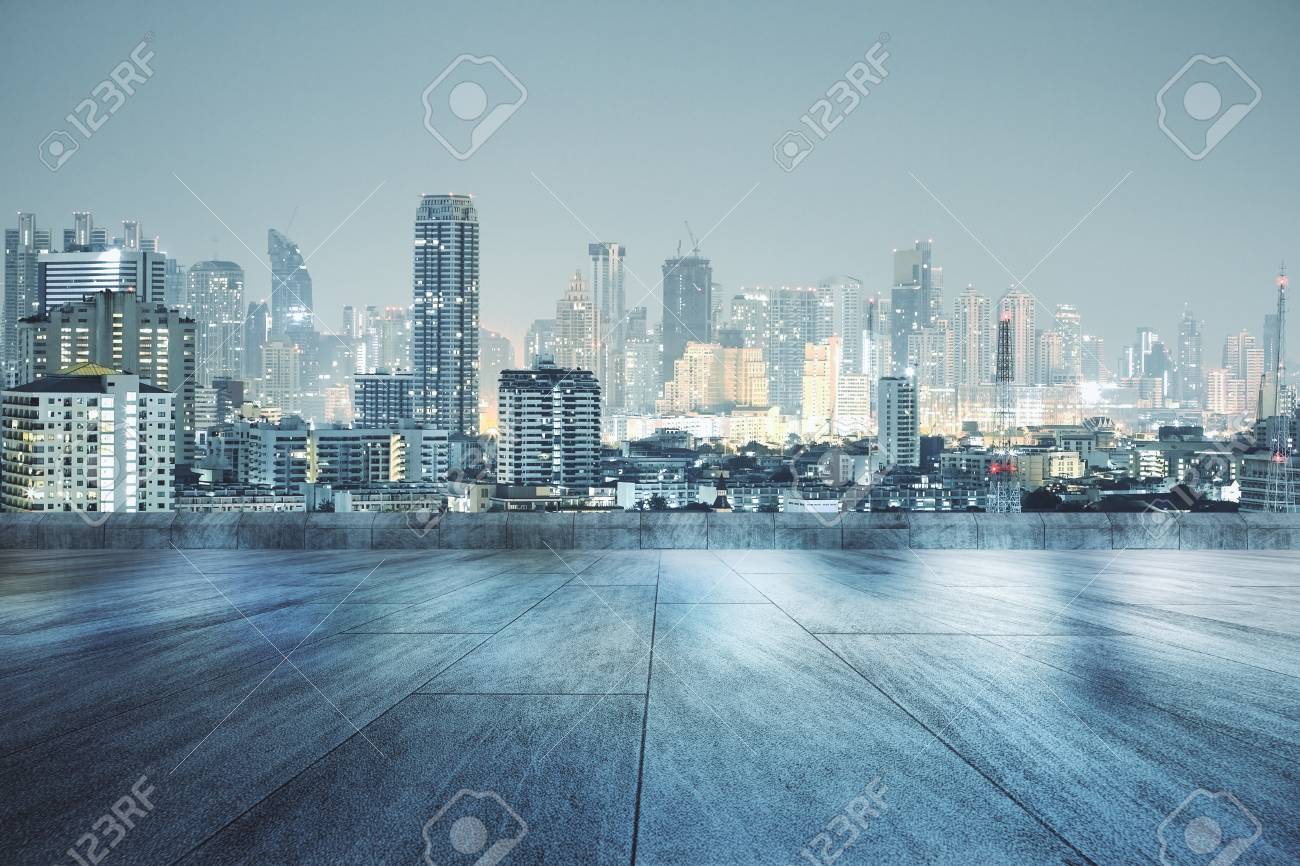Concrete Rooftop With Beautiful Night City View Wallpaper Stock