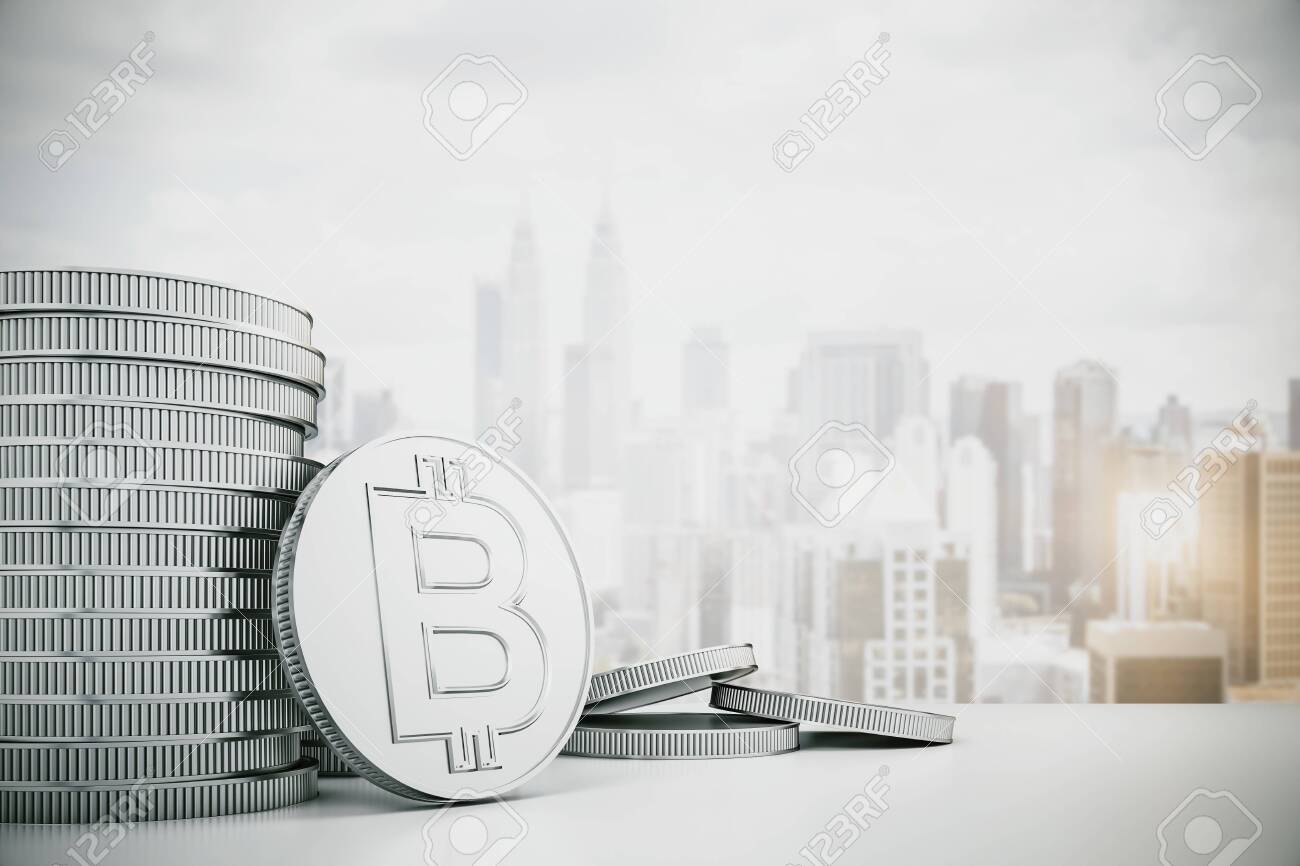 Creative Silver Bitcoin Piles On Blurry City Background. Cryptocurrency And  E-commerce Concept. 3D Rendering Stock Photo, Picture and Royalty Free  Image. Image 126045343.
