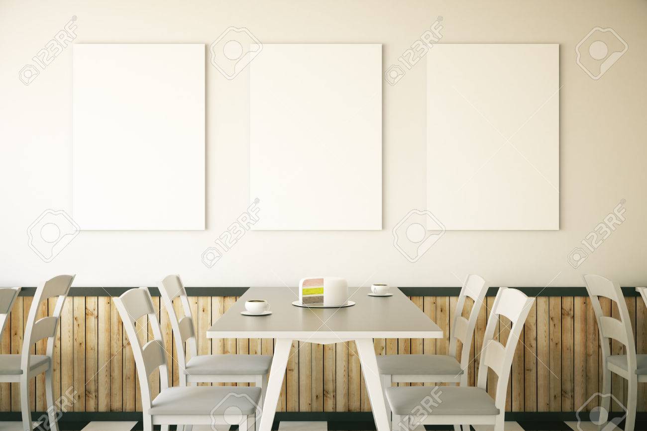 cafe interior with cake on table and three blank posters on light cafe interior with cake on table and three blank posters on light