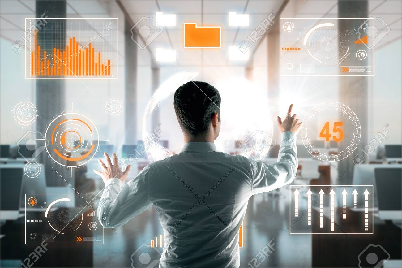 Vista Trasera Del Joven Empresario De Gestión De Gráficos De Negocios En El Interior Moderno. Concepto De Gestión De Fondos. Representación 3D Fotos, Retratos, Imágenes Y Fotografía De Archivo Libres De Derecho.