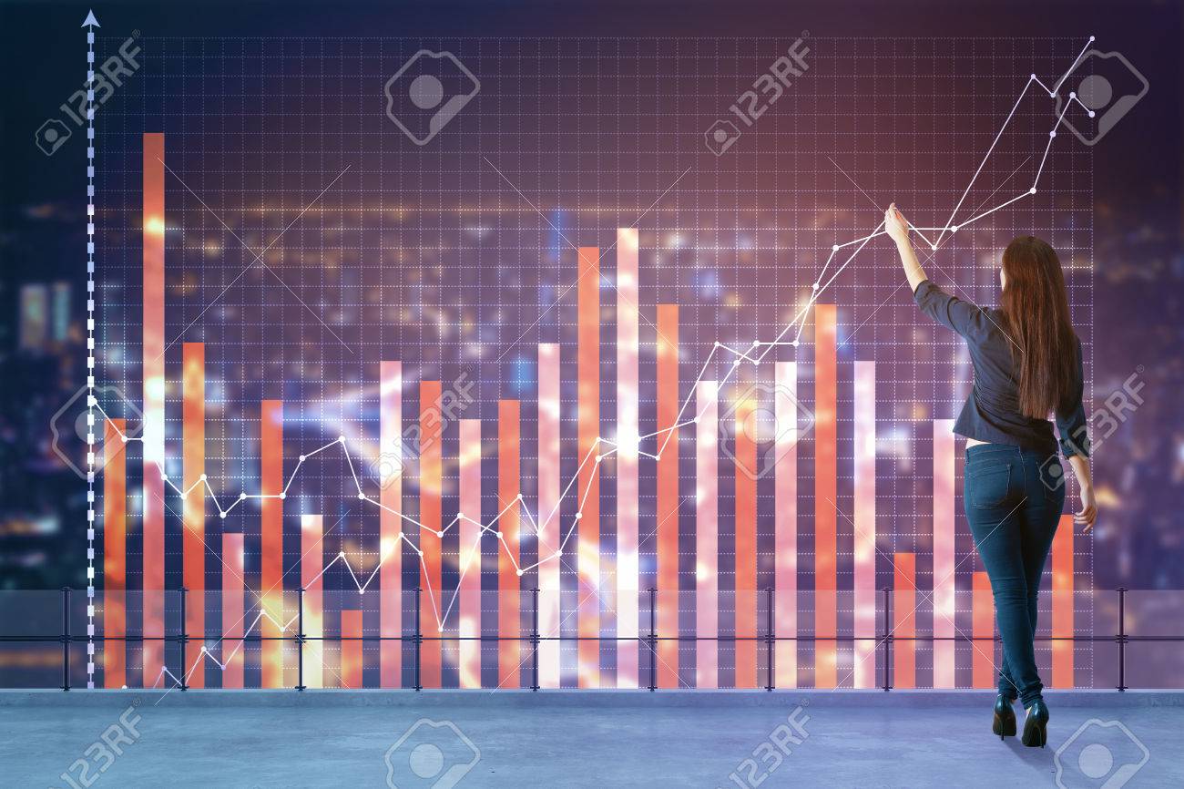 Back View Of Young Woman Drawing Business Chart Hologram On 