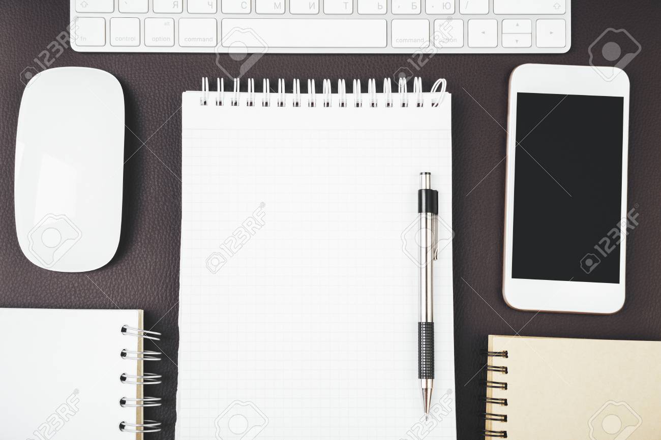 Top View And Close Up Of Modern Office Desk With Empty Smartphone