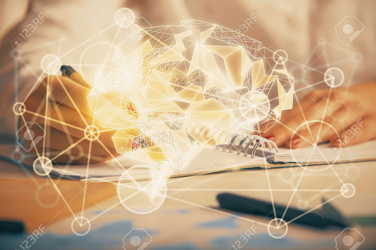 Double exposure of woman's writing hand on background with brain hologram. Concept of brainstorming. - 154070550 Double exposure of woman's writing hand on background with brain hologram. Concept of brainstorming. - 154070550