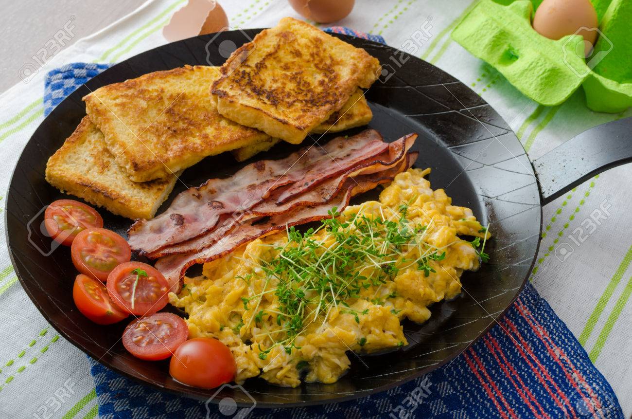 Scrambled Eggs With Bacon And French Toast On A Cast Iron Pan Stock Photo Picture And Royalty Free Image Image 38132289