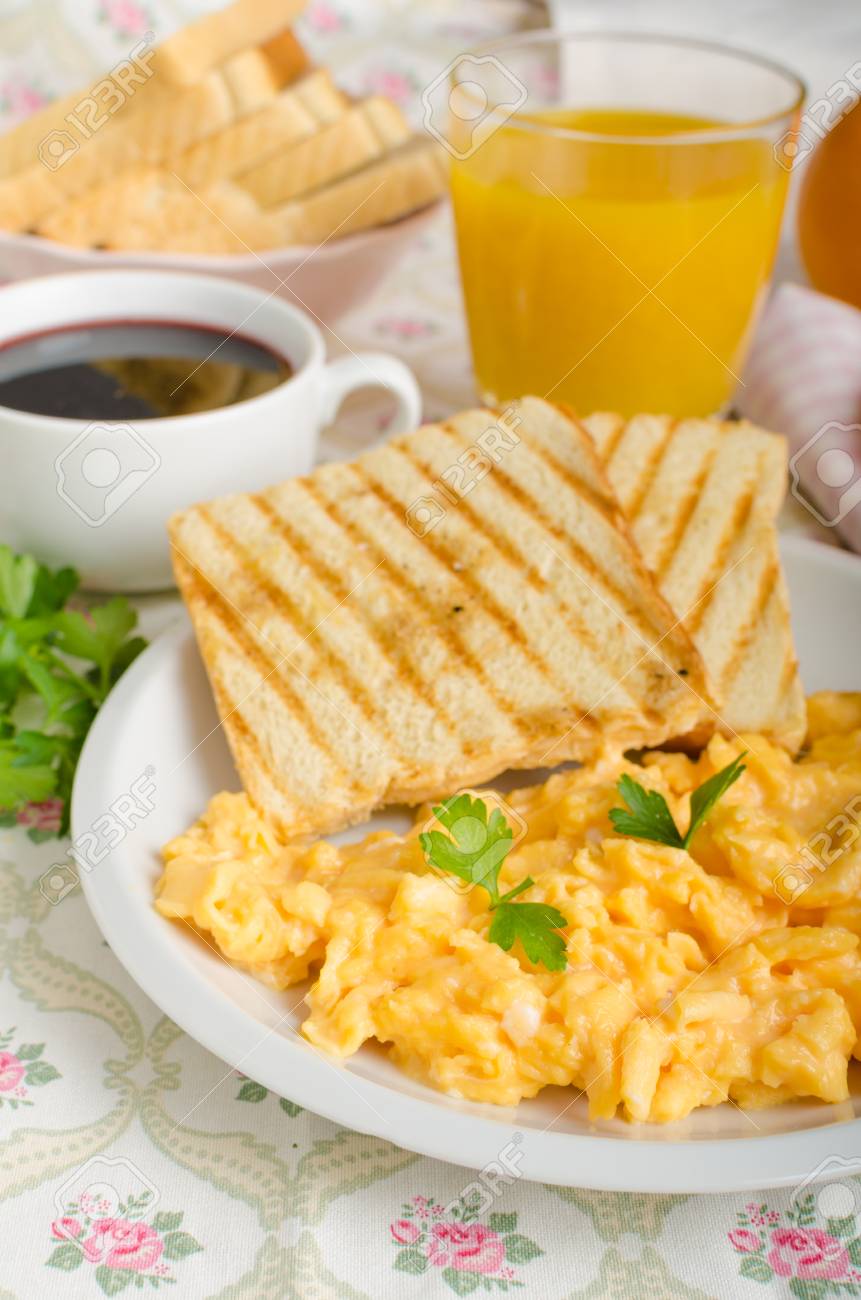 Breakfast With Scrambled Eggs French Toast Fresh Juice And Stock Photo Picture And Royalty Free Image Image