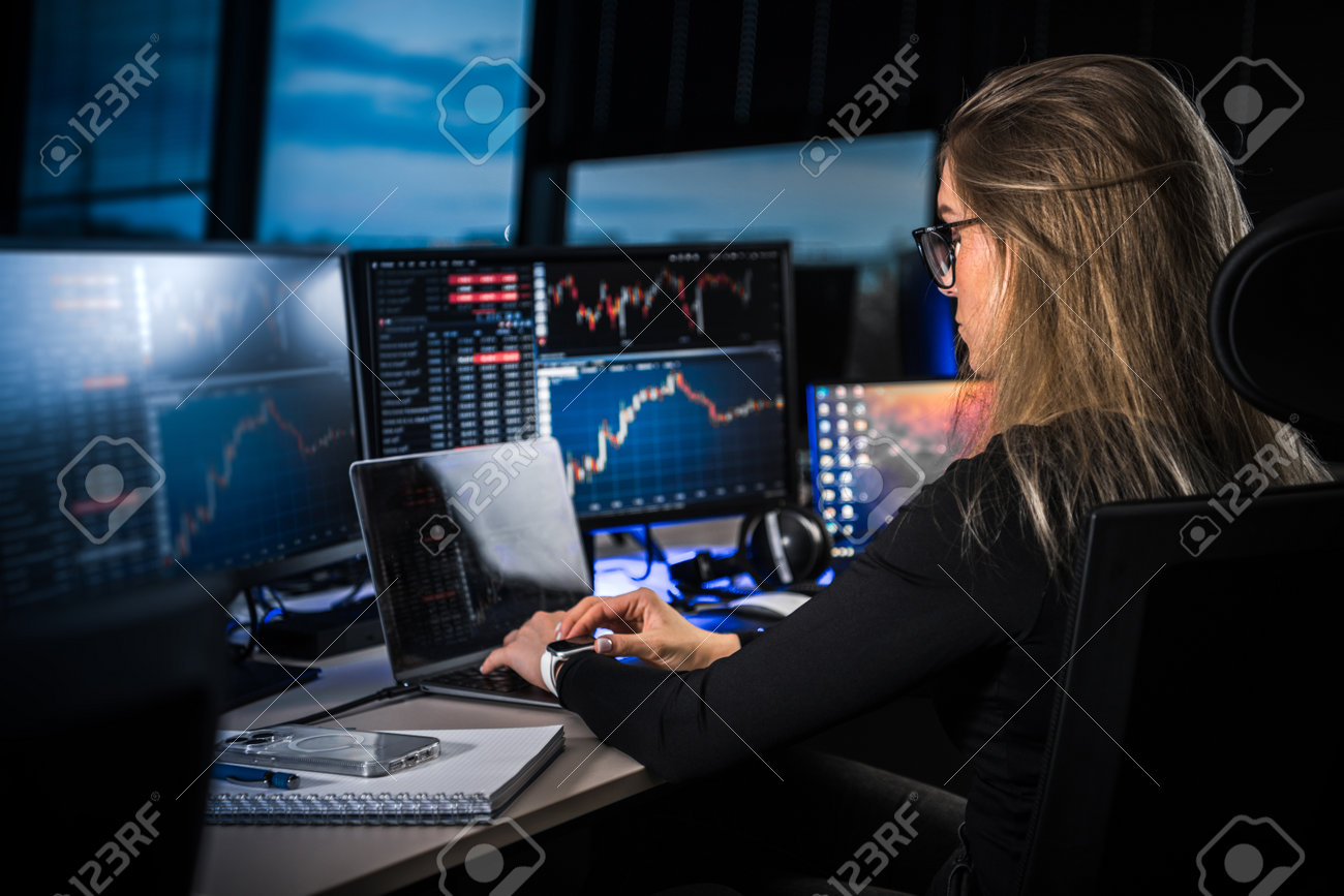 Cryptocurrency Stock Market Female Trader. Cryptocurrency Professional  Trader. Night Work. Working Late. Computer Screens. Stock Photo, Picture  and Royalty Free Image. Image 208992059.