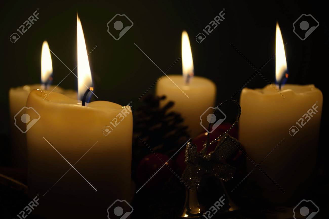 white candles in front of a black background - 27559747 white candles in front of a black background - 27559747