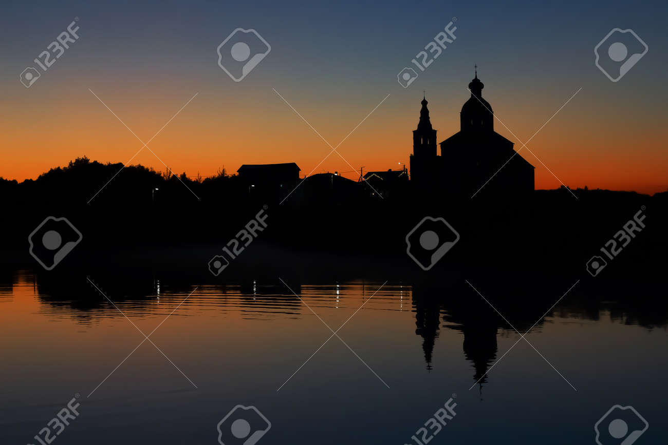 Silhouette of the Church of Elijah the Prophet at sunset in Suzdal. Nature background sunset on the river. - 171564892 Silhouette of the Church of Elijah the Prophet at sunset in Suzdal. Nature background sunset on the river. - 171564892