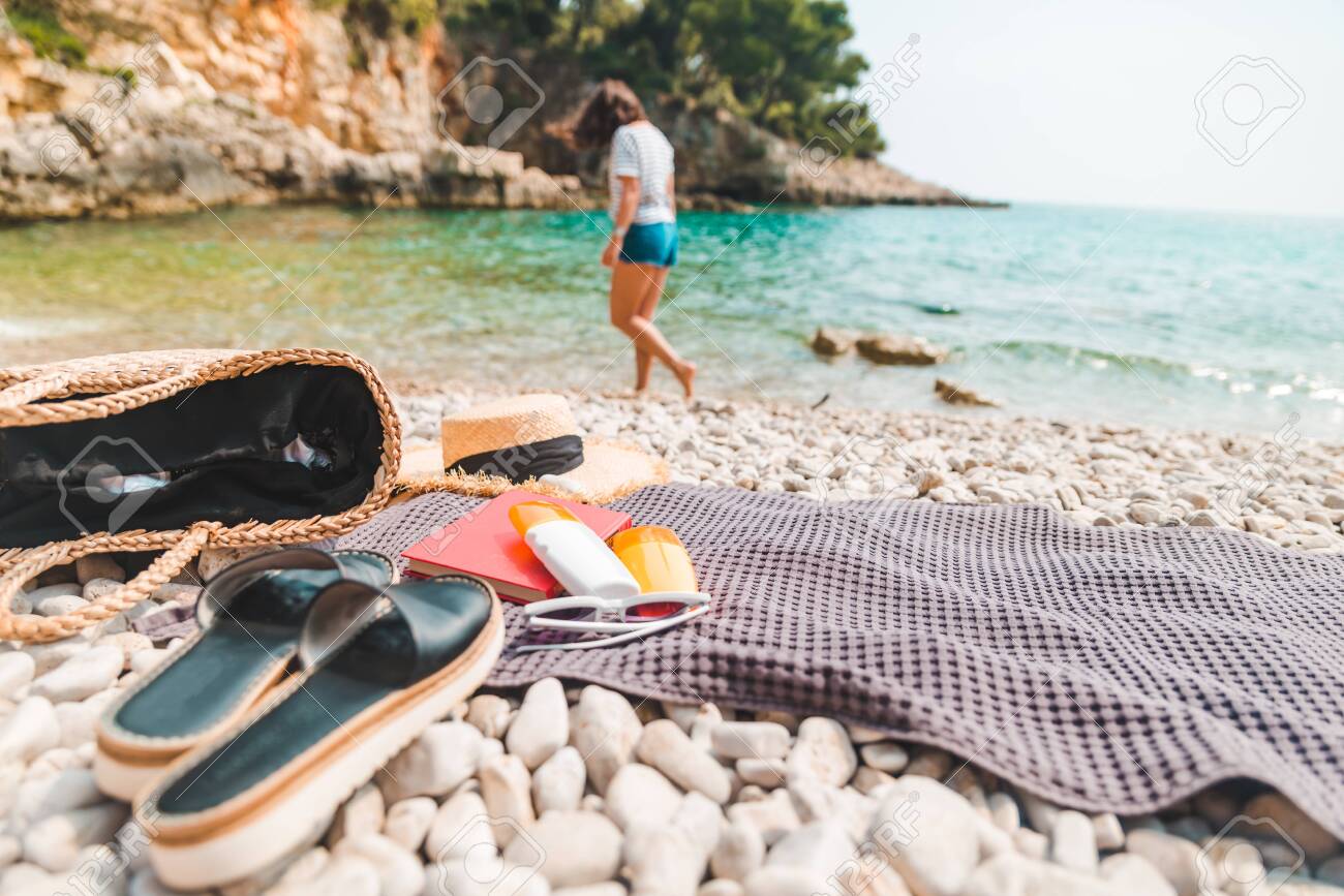 Young Pretty Woman In Summer Outfit Walking By Sea Shore Blanket Stock Photo Picture And Royalty Free Image Image 151396258