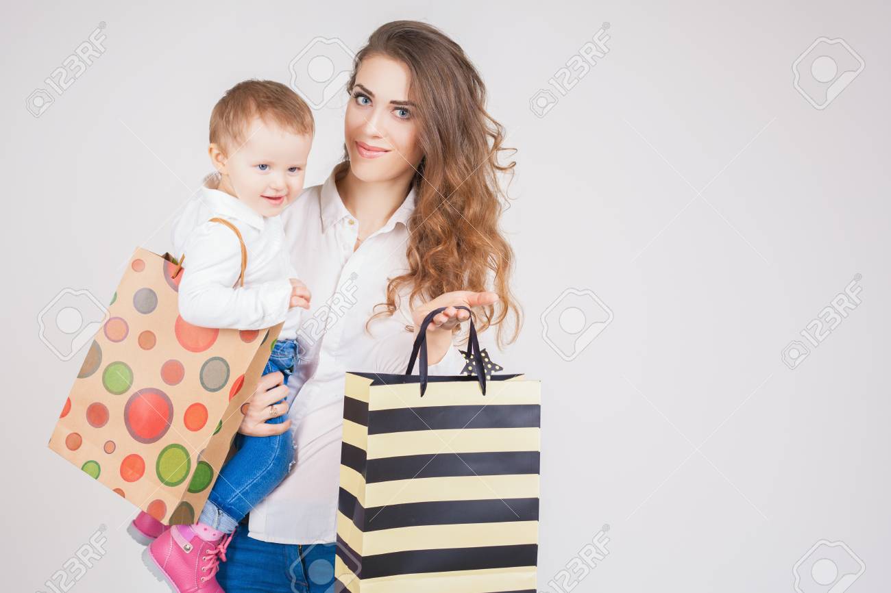 baby holding bag