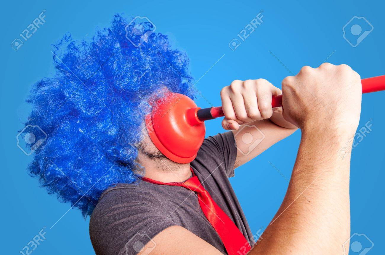 Funny Guy Holding Red Plunger In His Face With Blue Background Stock Photo,  Picture And Royalty Free Image. Image 16549621.