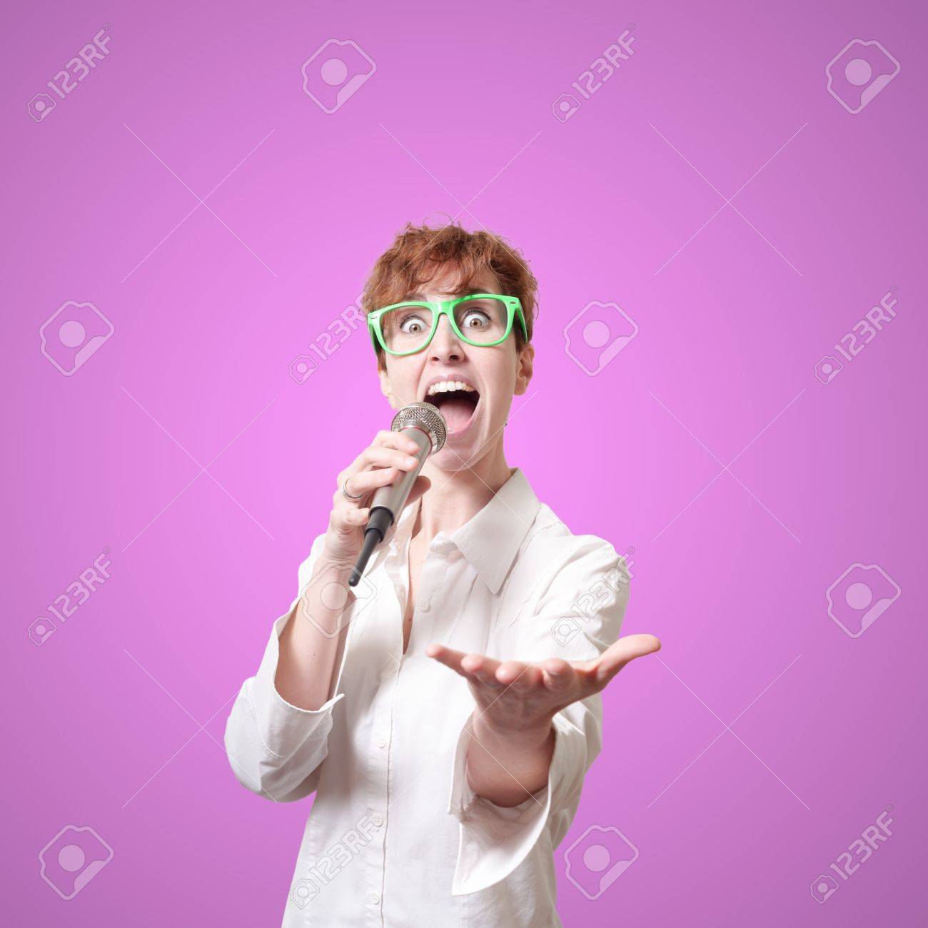 Funny Short Hair Singing On Pink Background Stock Photo Picture