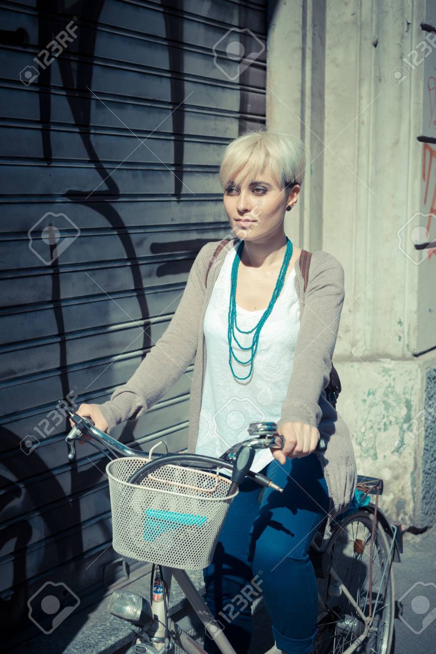 Beautiful Young Blonde Short Hair Hipster Woman Witk Bike In