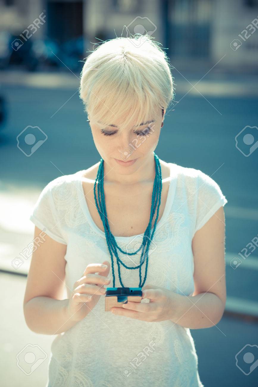 Beautiful Young Blonde Short Hair Hipster Woman In The City Stock