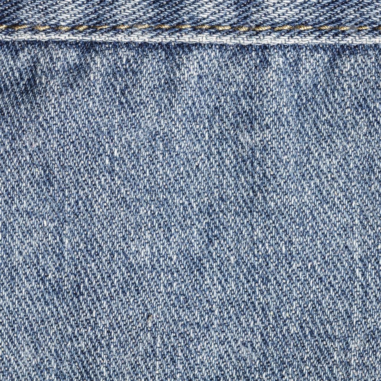 Pantalones De Mezclilla Textura O Jeans De Fondo Con Costura. Pantalones Vaqueros Del Dril De Vintage Grunge Viejo. Fondo Cosido De Pantalones Vaqueros Del De Algodón De Textura