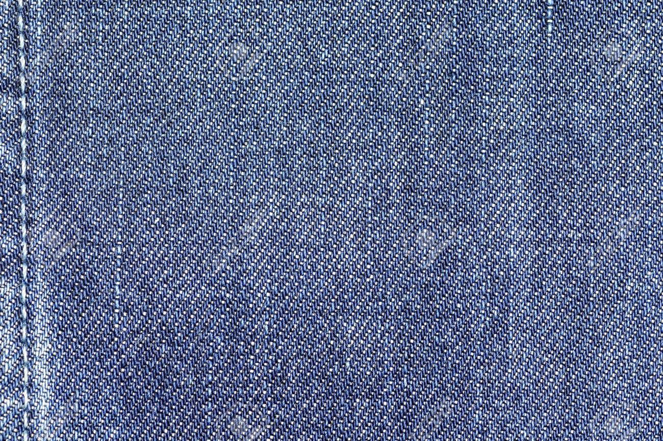 デニム ジーンズの生地テクスチャ背景美服の縫い目 ファッション ビジネス デザインと産業建設アイデア コンセプト の写真素材 画像素材 Image