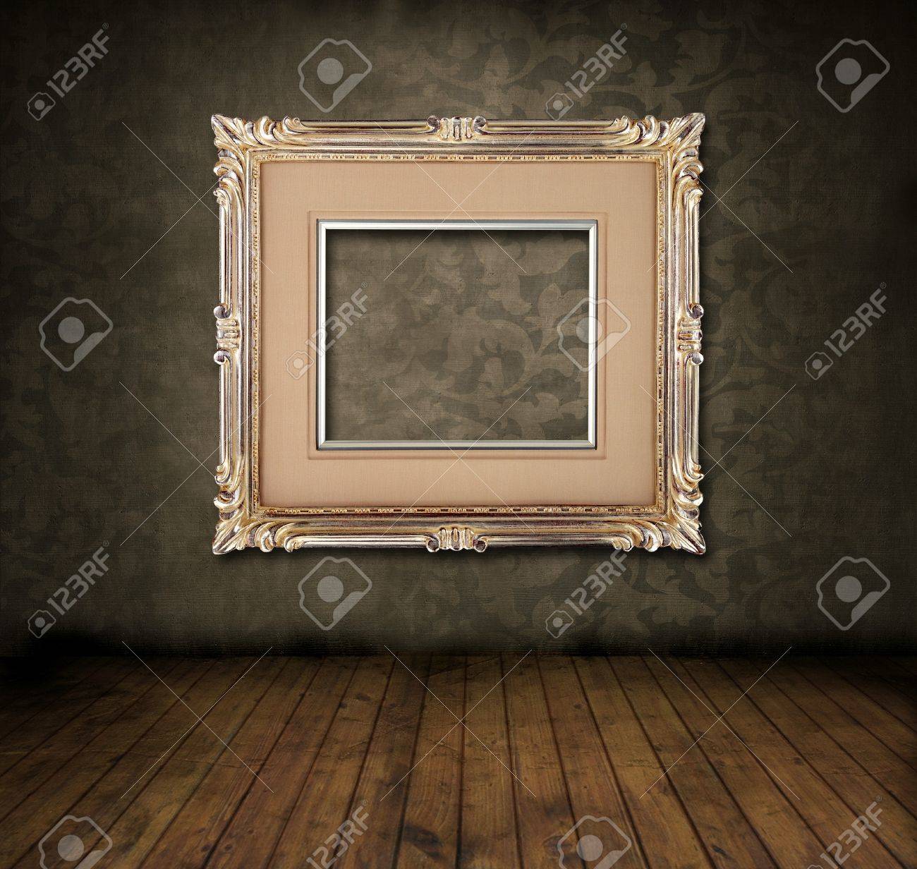 Grungy room with floral vintage wallpaper, wood floor and antique frame - 4418518 Grungy room with floral vintage wallpaper, wood floor and antique frame - 4418518