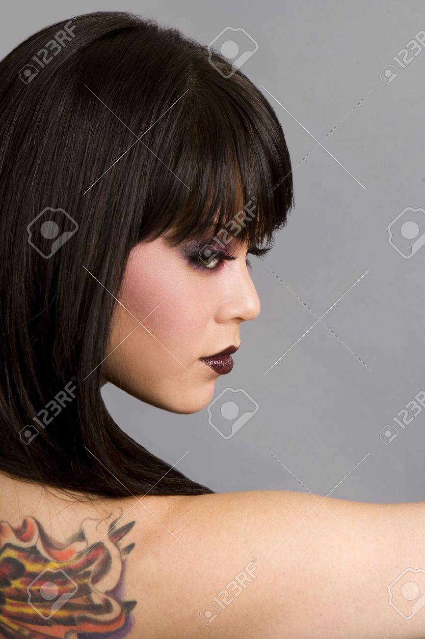 Beautiful exotic woman with colorful tattoo - 5065272 Beautiful exotic woman with colorful tattoo - 5065272