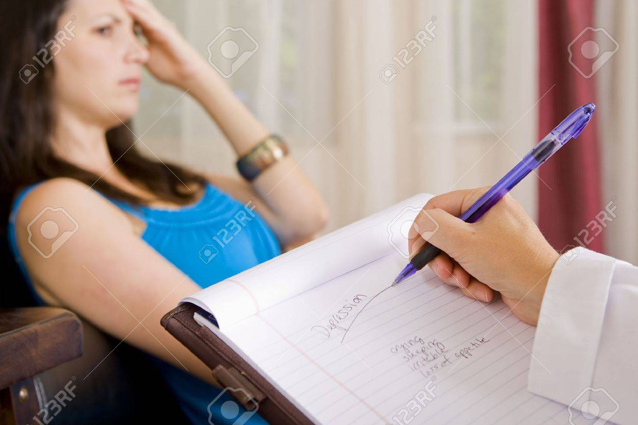 Depressed woman talking to her therapist - 5335864 Depressed woman talking to her therapist - 5335864