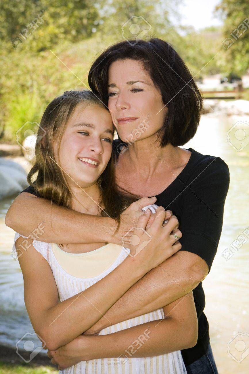 Mother and daughter outdoors on a Spring day - 5413212 Mother and daughter outdoors on a Spring day - 5413212