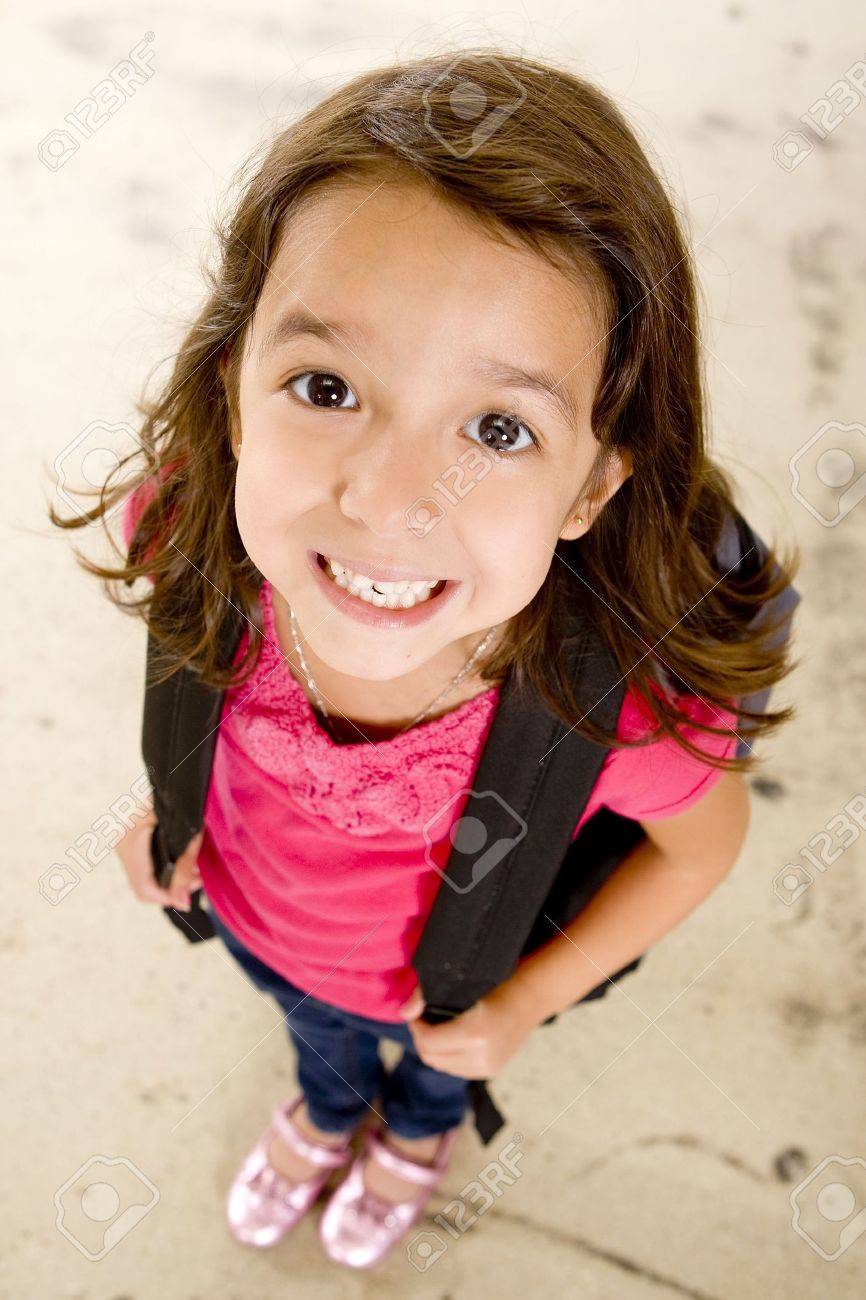 Little girl with her book bag - 5679685 Little girl with her book bag - 5679685