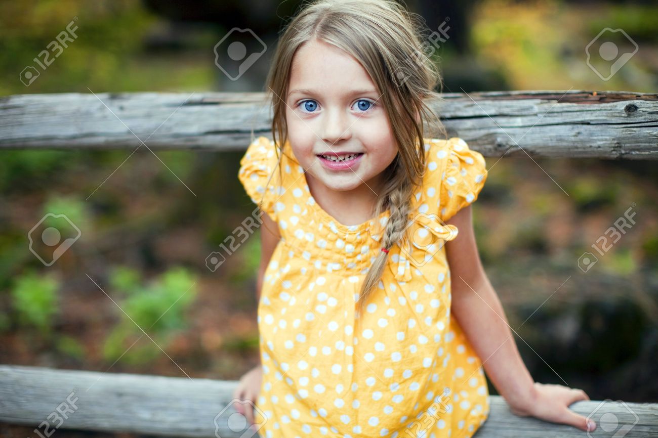 Portrait Of A Cute Little Girl Outside Stock Photo Picture And Royalty Free Image Image