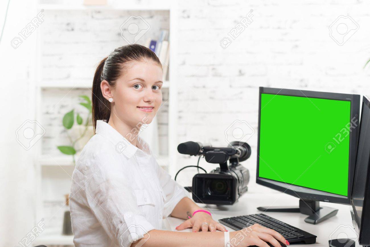 pretty young woman video editor with green screen - 43625810 pretty young woman video editor with green screen - 43625810