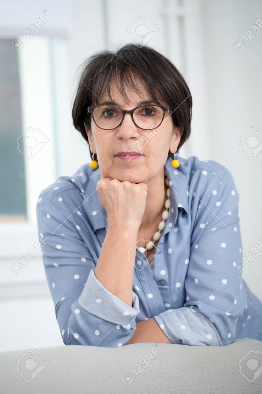 a portrait of middle age brunette with glasses - 95308393 a portrait of middle age brunette with glasses - 95308393