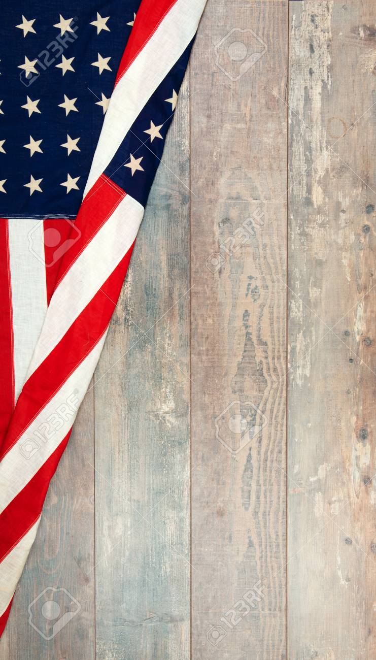 An American Flag Lying On An Aged, Weathered Rustic Wooden Background.  Stock Photo, Picture and Royalty Free Image. Image 124989165., image size:741x1300