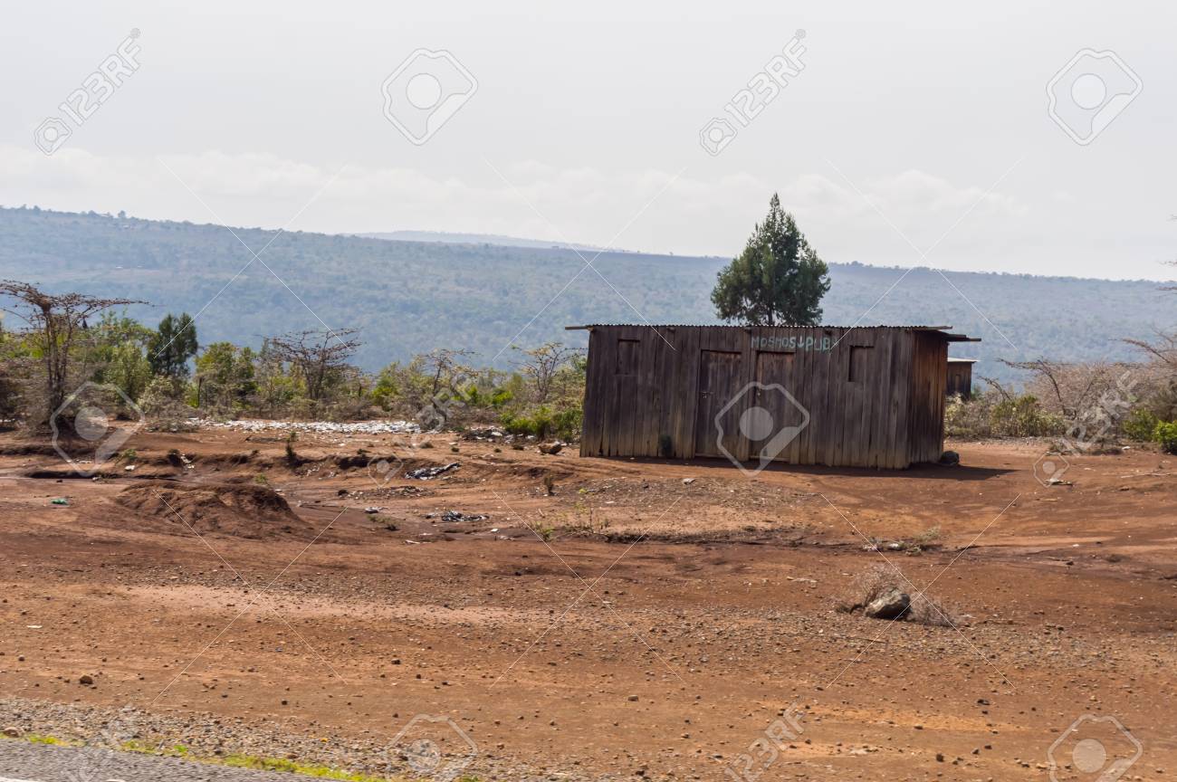wooden and sheet metal barn along nairobi road to ambosseli park sheet metal barn