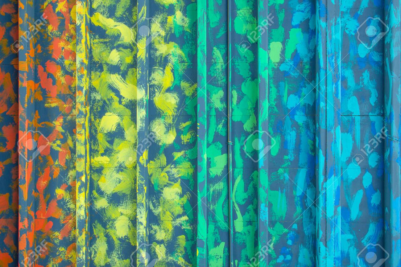 Multicolor zinc texture, Art color metal door. Wall room background container office design. Materials to build a house for sun and rain protection. Closeup modern texture pattern steel home decor. - 142286833 Multicolor zinc texture, Art color metal door. Wall room background container office design. Materials to build a house for sun and rain protection. Closeup modern texture pattern steel home decor. - 142286833