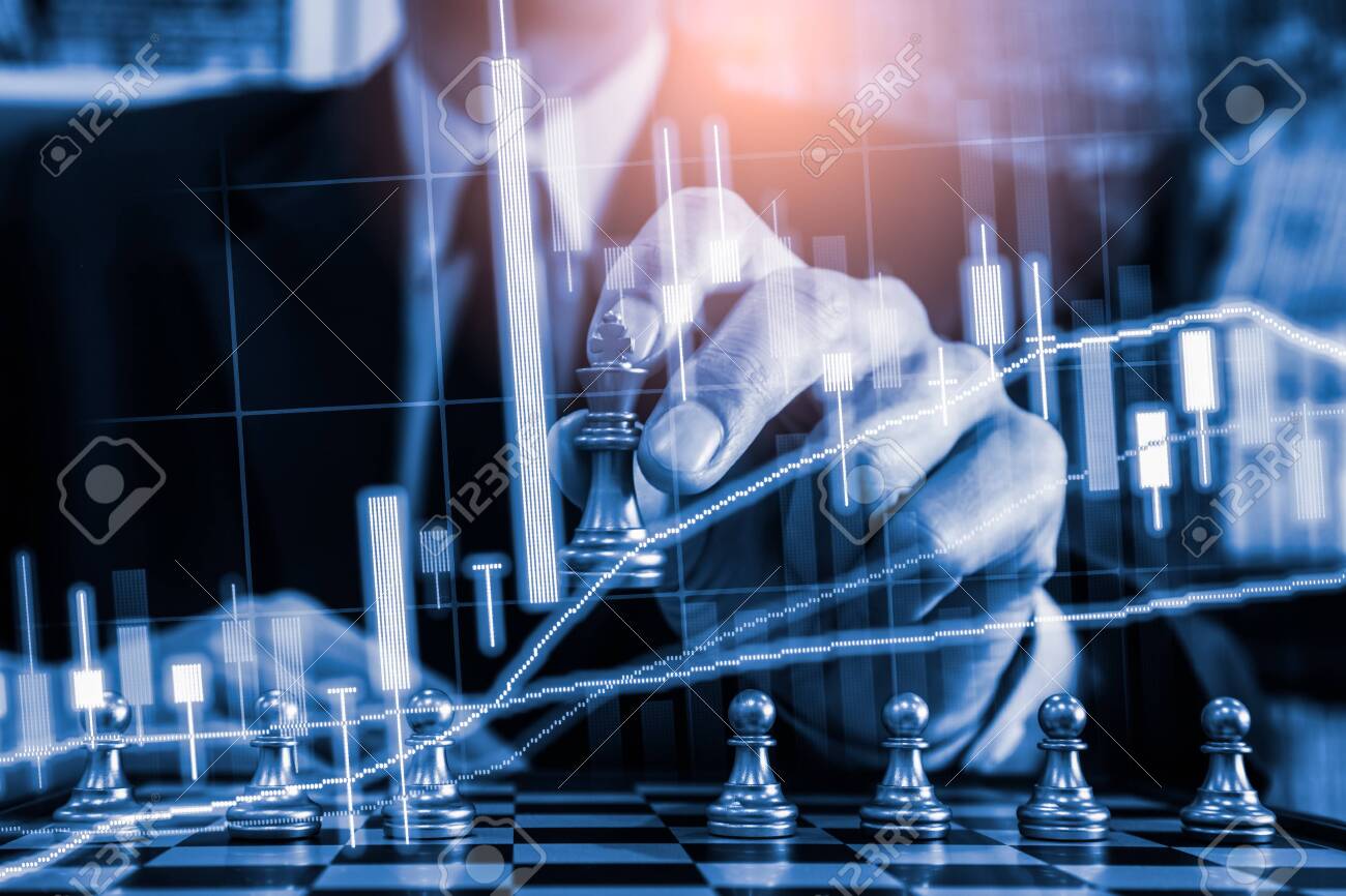 Chess game on chess board on stock market or forex trading graph chart for financial investment concept. Economy trends for digital business marketing strategy analysis. Abstract finance background. - 145764745 Chess game on chess board on stock market or forex trading graph chart for financial investment concept. Economy trends for digital business marketing strategy analysis. Abstract finance background. - 145764745