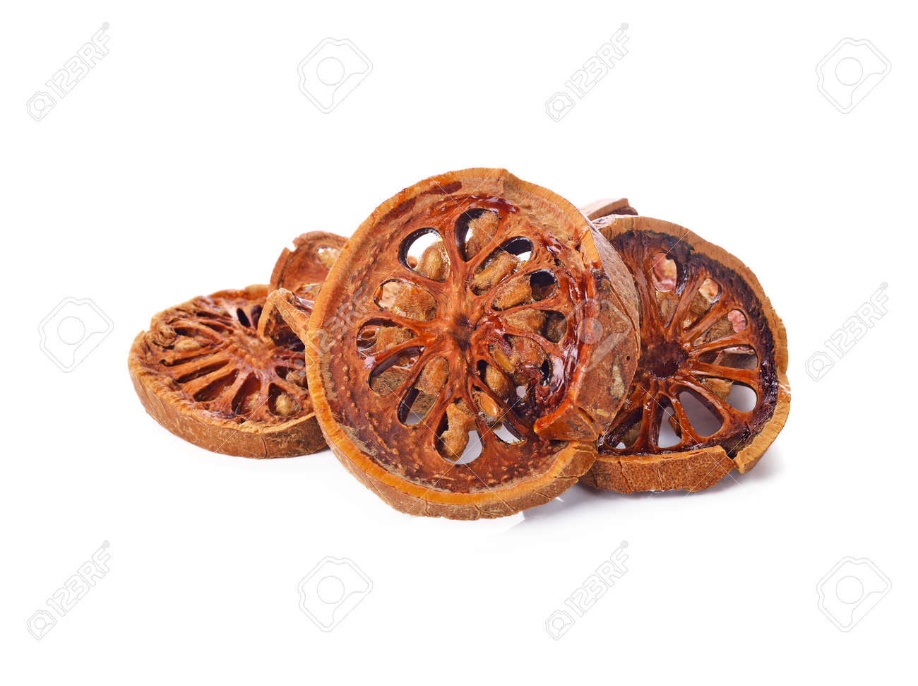 Aegle marmelos. Dry bael fruit on white background - 169847568 Aegle marmelos. Dry bael fruit on white background - 169847568