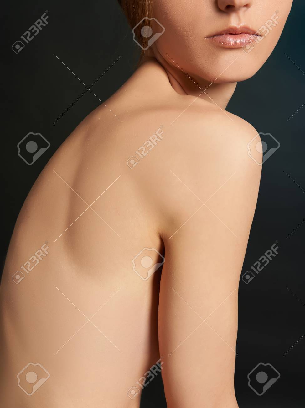 Young Woman Covers Her Breast. Nude Body Girl Without Face Stock Photo,  Picture and Royalty Free Image. Image 64817026.