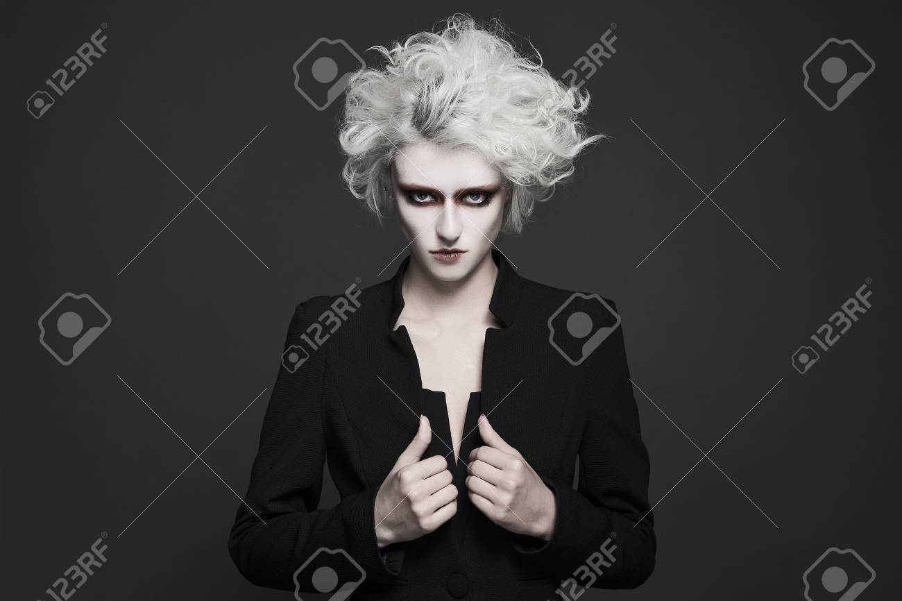 fashion young woman with white skin and hair with clown make-up.freaky halloween make-up style girl - 94431927 fashion young woman with white skin and hair with clown make-up.freaky halloween make-up style girl - 94431927