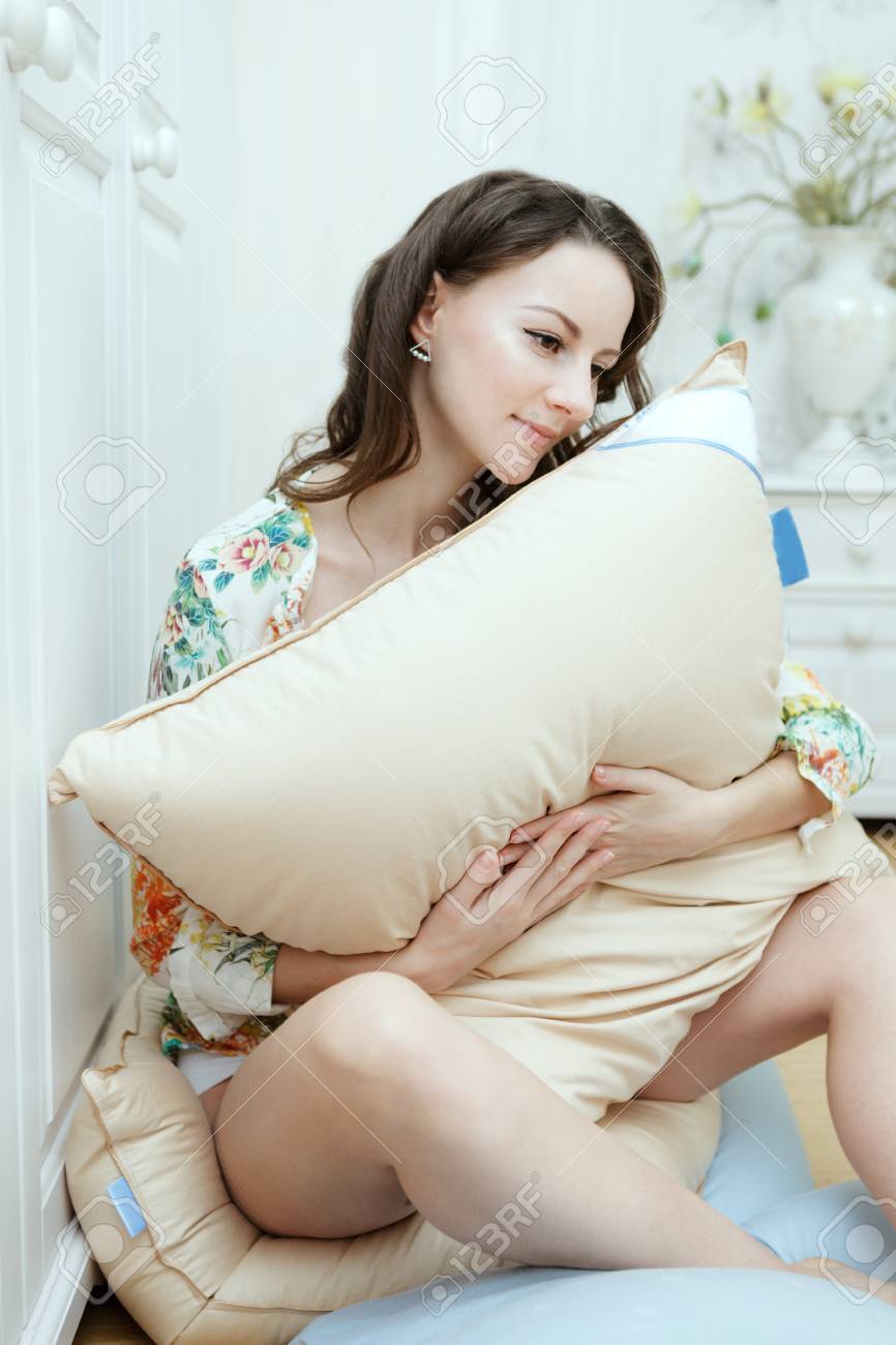 pillow sitting on bed