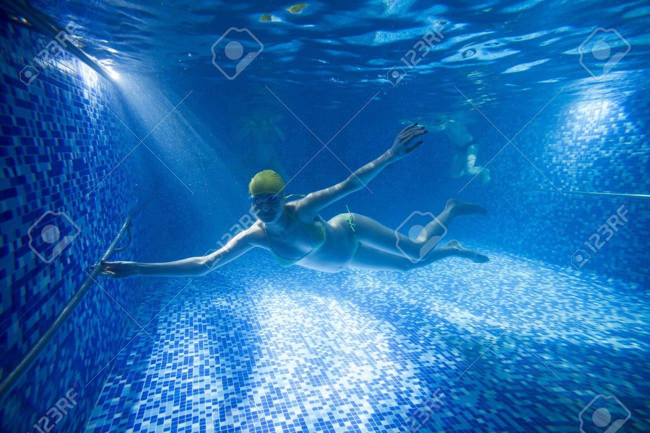 Young Pregnant Woman Underwater In Swimming Pool Stock Photo Young Pregnant Woman Underwater In Swimming Pool Stock Photo