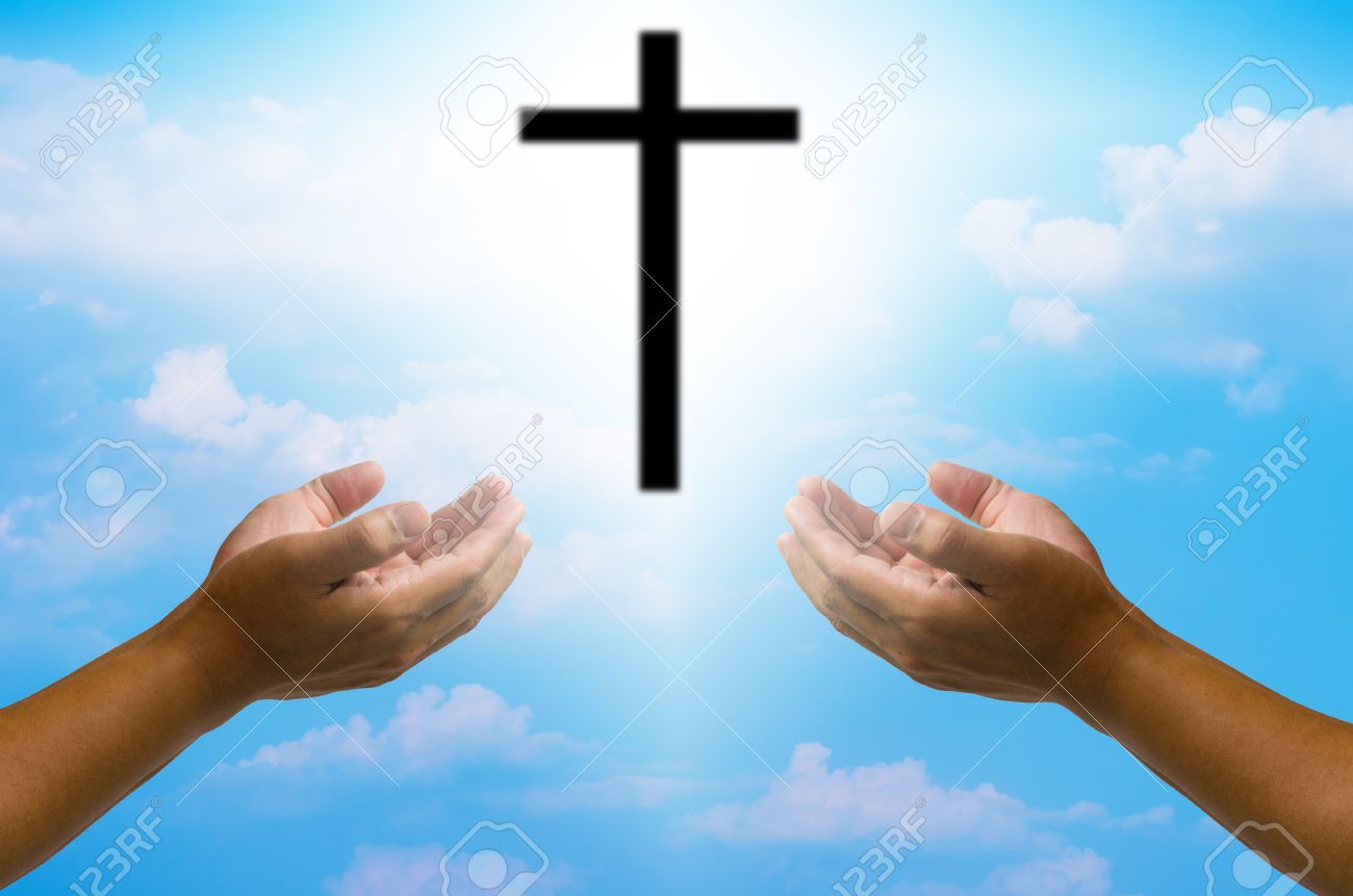 open hands praying the cross on blur sky background. - 40380617 open hands praying the cross on blur sky background. - 40380617