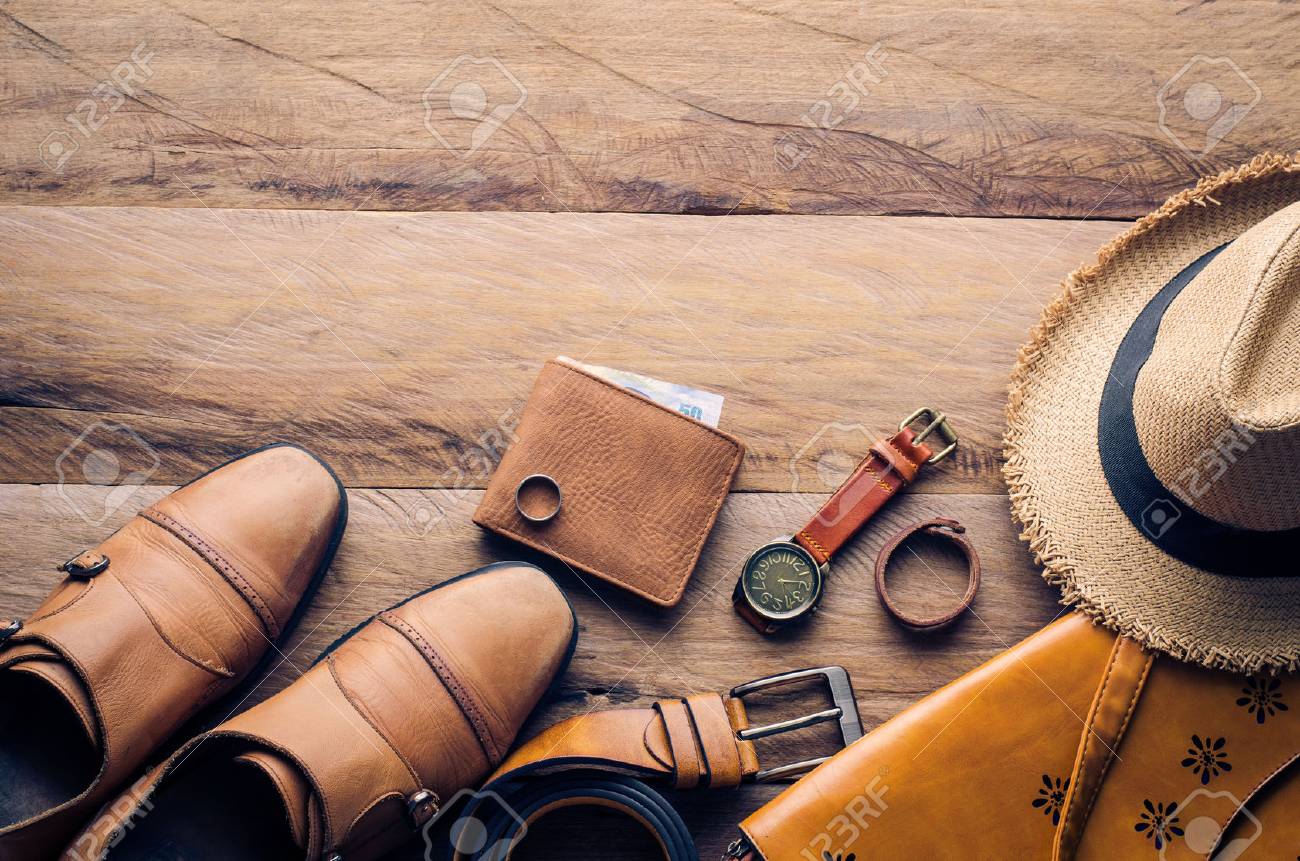 Clothing and accessories for men on wood floor - 63312478 Clothing and accessories for men on wood floor - 63312478