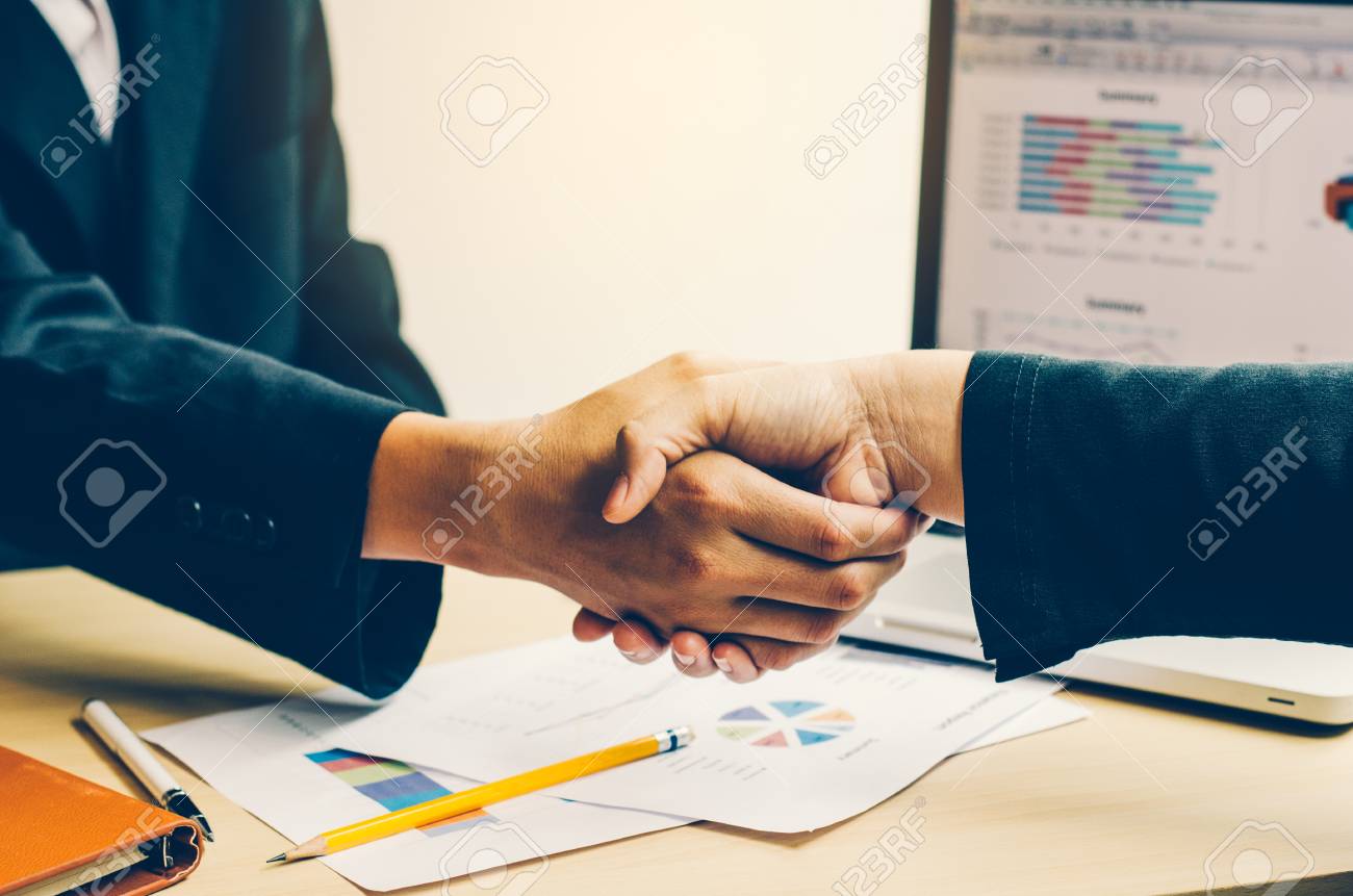 Handshake between joint venture businessmen after good management and have good concept - 86578480 Handshake between joint venture businessmen after good management and have good concept - 86578480